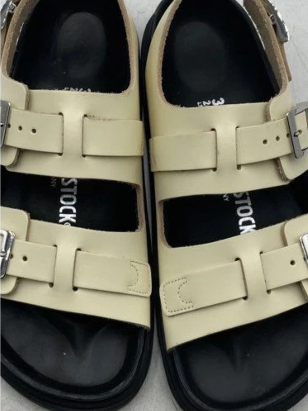 Birkenstock Two-Strap Sandals in Cream and Black